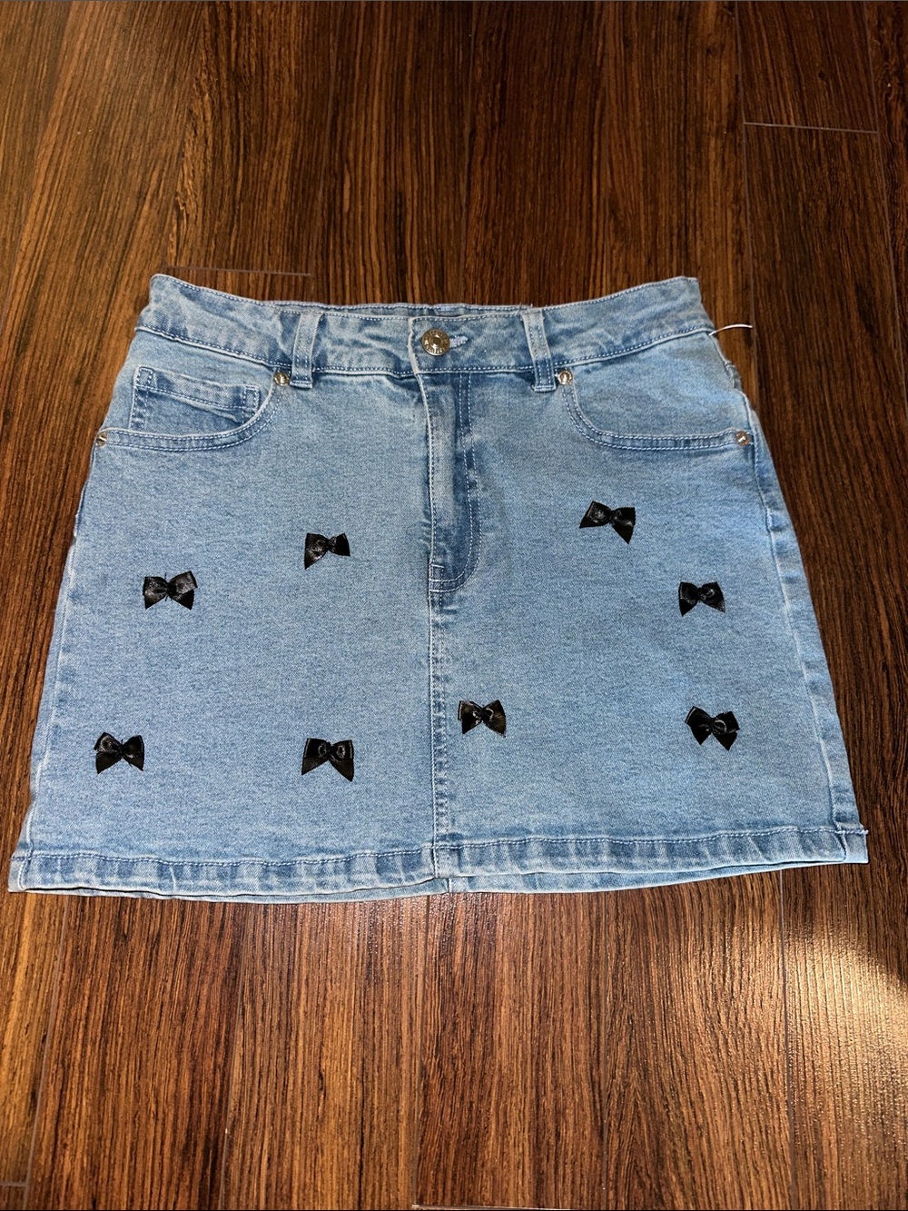Forever 21 Light Blue Denim Mini Skirt with Black Bow Accents